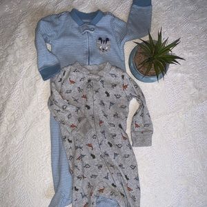 2 Carter’s boys 9 mo. long sleeve, footed sleepers